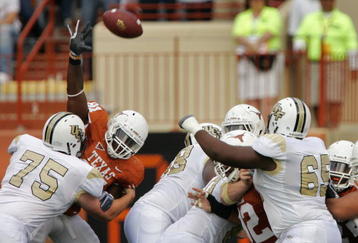 AUSTIN, TX - NOVEMBER 07:  Defensive end Sam Acho #81 of the Texas Longhorns nearly blocks a field goal by the UCF Knights on November 7, 2009 at Darrell K Royal - Texas Memorial Stadium in Austin, Texas.  Texas won 35-3.  (Photo by Brian Bahr/Getty Images)