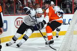 PHILADELPHIA - NOVEMBER 02:  Ryan Malone #12 of the Tampa Bay Lightning skates against Danny Syvret #26 of the Philadelphia Flyers on November 2, 2009 at Wachovia Center in Philadelphia, Pennsylvania. The Flyers won the game 6-2.  (Photo by Jim McIsaac/Getty Images)