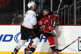 NEWARK, NJ - NOVEMBER 11:  Scott Niedermayer #27 of the Anaheim Ducks defends against Patrik Elias #26 of the New Jersey Devils during their NHL game at the Prudential Center on November 11, 2009 in Newark, New Jersey.  (Photo by Jim McIsaac/Getty Images)