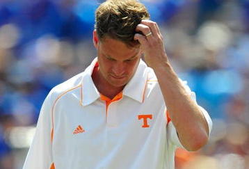 GAINESVILLE, FL - SEPTEMBER 19:  Head coach Lane Kiffin of the Tennessee Volunteers watches the action prior to the game against the Florida Gators at Ben Hill Griffin Stadium on September 19, 2009 in Gainesville, Florida.  (Photo by Sam Greenwood/Getty Images)