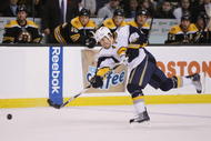 BOSTON - NOVEMBER 07:  Steve Montador #4 of the Buffalo Sabres takes a shot against the Boston Bruins on November 7, 2009 at the TD Garden in Boston, Massachusetts. The Bruins defeated the Sabres 4-2.  (Photo by Elsa/Getty Images)