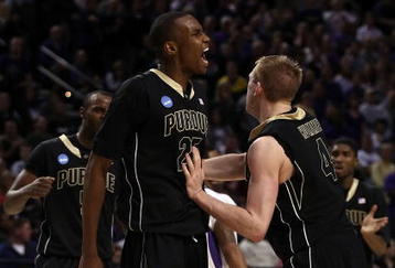 PORTLAND, OR - MARCH 21:  JaJuan Johnson #25 and Robbie Hummel #4 of the Purdue Boilermakers react after Johnson makes a basket and is fouled in the second half during the second round of the NCAA Division I Men's Basketball Tournament at the Rose Garden on March 21, 2009 in Portland, Oregon.  (Photo by Jonathan Ferrey/Getty Images)