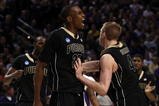 PORTLAND, OR - MARCH 21:  JaJuan Johnson #25 and Robbie Hummel #4 of the Purdue Boilermakers react after Johnson makes a basket and is fouled in the second half during the second round of the NCAA Division I Men's Basketball Tournament at the Rose Garden on March 21, 2009 in Portland, Oregon.  (Photo by Jonathan Ferrey/Getty Images)