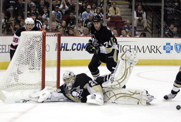 PITTSBURGH, PA - NOVEMBER 12:  Marc-Andre Fleury #29 of the Pittsburgh Penguins makes a save against the New Jersey Devils in the second period at Mellon Arena on November 12, 2009 in Pittsburgh, Pennsylvania.(Photo by Justin K. Aller/Getty Images)