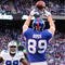 EAST RUTHERFORD, NJ - NOVEMBER 02:  Kevin Boss #89 of the New York Giants scores a touchdown against the Dallas Cowboys on November 2, 2008 at Giants Stadium in East Rutherford, New Jersey.  (Photo by Al Bello/Getty Images)