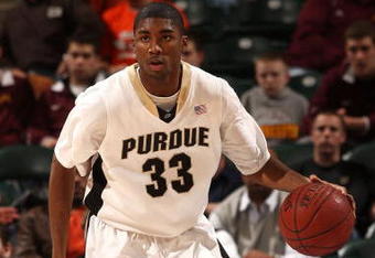 INDIANAPOLIS - MARCH 13:  E'Twaun Moore #33 of the Purdue Boilermakers brings the ball up court against the Penn State Nittany Lions during the second round of the Big Ten Men's Basketball Tournament at Conseco Fieldhouse on March 13, 2009 in Indianapolis, Indiana.  (Photo by Jonathan Daniel/Getty Images)