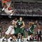 DETROIT - APRIL 04:  Stanley Robinson #21 of the Connecticut Huskies dunks against Goran Suton #14 of the Michigan State Spartans during the National Semifinal game of the NCAA Division I Men's Basketball Championship at Ford Field on April 4, 2009 in Detroit, Michigan. Michigan State won 82-73. (Photo by Andy Lyons/Getty Images)