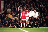 19 Feb 1997:  Peter Schmeichel of Manchester United lies injured after clashing with Ian Wright of Arsenal during the FA Carling Pemiership match between Arsenal and Manchester United at Highbury, London. Mandatory Credit: Stu Forster/ALLSPORT