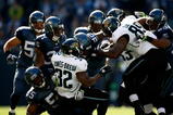 SEATTLE, WA - OCTOBER 11:  The defense of the Seattle Seahawks stops Maurice Jones-Drew #32 of the Jacksonville Jaguars at Qwest Field on October 11, 2009 in Seattle, Washington.  (Photo by Jonathan Ferrey/Getty Images)