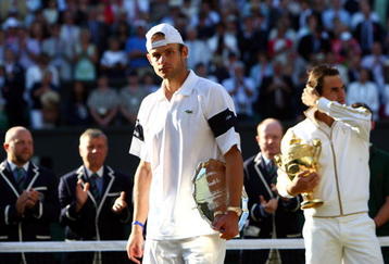 WIMBLEDON, ENGLAND - JULY 05:  Andy Roddick of USA looks despondent after defeat during the men's singles final match against Roger Federer of Switzerland on Day Thirteen of the Wimbledon Lawn Tennis Championships at the All England Lawn Tennis and Croquet Club on July 5, 2009 in London, England. Federer won 5-7, 7-6, 7-6, 3-6, 16-14.  (Photo by Clive Brunskill/Getty Images)