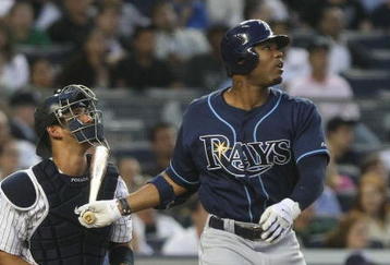 NEW YORK - JUNE 08:  Carl Crawford #13 of the Tampa Bay Rays at bat against the New York Yankees on June 8, 2009 at Yankee Stadium in the Bronx borough of New York City.  (Photo by Nick Laham/Getty Images)