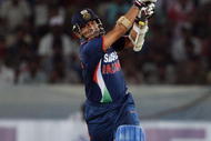 HYDERABAD, INDIA - NOVEMBER 05:  Sachin Tendulkar of India hits out during the fifth One Day International match between India and Australia at Rajiv Gandhi International Cricket Stadium on November 5, 2009 in Hyderabad, India.  (Photo by Mark Kolbe/Getty Images)