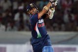 HYDERABAD, INDIA - NOVEMBER 05:  Sachin Tendulkar of India hits out during the fifth One Day International match between India and Australia at Rajiv Gandhi International Cricket Stadium on November 5, 2009 in Hyderabad, India.  (Photo by Mark Kolbe/Getty Images)