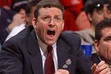 MILWAUKEE - MARCH 19: Head coach Kirk Speraw of the Central Florida Golden Knights reacts to a referee's call during the first round game of the NCAA Division I Men's Basketball Tournament against the Pittsburgh Panthers at Bradley Center on March 19, 2004 in Milwaukee, Wisconsin. Pittsburgh defeated Central Florida 53-44. (Photo by Jonathan Daniel/Getty Images)