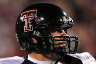 NORMAN, OK - NOVEMBER 22:  Quarterback Graham Harrell #6 of the Texas Tech Red Raiders drops back to pass against the Oklahoma Sooners in the first quarter at Memorial Stadium on November 22, 2008 in Norman, Oklahoma.  (Photo by Ronald Martinez/Getty Images)