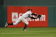 PHILADELPHIA - NOVEMBER 01:  Johnny Damon #18 of the New York Yankees can't make a play on a RBI double hit by Chase Utley #26 of the Philadelphia Phillies in the bottom of the first inning of Game Four of the 2009 MLB World Series at Citizens Bank Park on November 1, 2009 in Philadelphia, Pennsylvania.  (Photo by Al Bello/Getty Images)