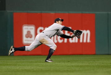 PHILADELPHIA - NOVEMBER 01:  Johnny Damon #18 of the New York Yankees can't make a play on a RBI double hit by Chase Utley #26 of the Philadelphia Phillies in the bottom of the first inning of Game Four of the 2009 MLB World Series at Citizens Bank Park on November 1, 2009 in Philadelphia, Pennsylvania.  (Photo by Al Bello/Getty Images)