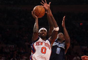 NEW YORK - NOVEMBER 09:  Larry Hughes #0 of the New York Knicks shoots the ball against Ronnie Brewer #9 of the Utah Jazz at Madison Square Garden on November 9, 2009 in New York City. NOTE TO USER: User expressly acknowledges and agrees that, by downloading and or using this photograph, User is consenting to the terms and conditions of the Getty Images License Agreement.  (Photo by Nick Laham/Getty Images)
