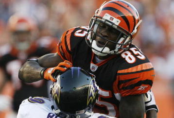 CINCINNATI - NOVEMBER 8: Chad Ochocinco #85 of the Cincinnati Bengals is tackled by Ed Reed #20 of the Baltimore Ravens at Paul Brown Stadium on November 8, 2009 in Cincinnati, Ohio.  (Photo by John Sommers II/Getty Images)