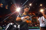 PARIS - NOVEMBER 13:  Novak Djokovic of Serbia leaves the court after winning his match against Robin Soderling of Sweden during the ATP Masters Series at the Palais Omnisports De Paris-Bercy on November 13, 2009 in Paris, France.  (Photo by Clive Rose/Getty Images)