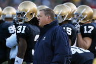 SOUTH BEND, IN - OCTOBER 17: Head coach Charlie Weis of the Notre Dame Fighting Irish gives instructions to his team during a game against the USC Trojans at Notre Dame Stadium on October 17, 2009 in South Bend, Indiana. USC defeated Notre Dame 34-27. (Photo by Jonathan Daniel/Getty Images)