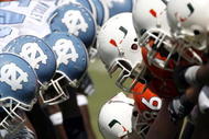 MIAMI - OCTOBER 7:  The University of Miami gets ready to snap the ball against North Carolina on October 7, 2006 at the Orange Bowl in Miami, Florida.  (Photo by Eliot J. Schechter/Getty Images)