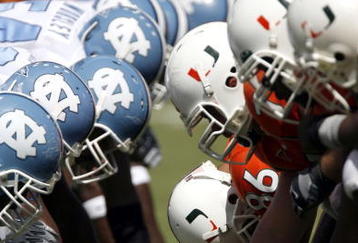 MIAMI - OCTOBER 7:  The University of Miami gets ready to snap the ball against North Carolina on October 7, 2006 at the Orange Bowl in Miami, Florida.  (Photo by Eliot J. Schechter/Getty Images)