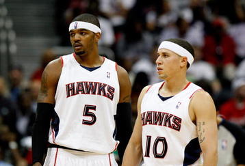 ATLANTA - OCTOBER 28:  Mike Bibby #10 and Josh Smith #5 of the Atlanta Hawks against the Indiana Pacers at Philips Arena on October 28, 2009 in Atlanta, Georgia.  (Photo by Kevin C. Cox/Getty Images)