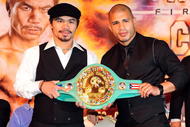 BEVERLY HILLS, CA - SEPTEMBER 14: Manny Pacquiao and Miguel Cotto pose for pictures during the press conference at the Beverly Hills Hotel on September 14, 2009 in Beverly Hills, California. (Photo by Jacob de Golish/Getty Images)
