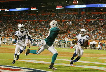 MIAMI - SEPTEMBER 21:  Defensive backs Kelvin Hayden #26 and Antoine Bethea #41 of the Indianapolis Colts watch as Ted Ginn Jr. #19 of the Miami Dolphins nearly hauls in a touchdown catch at Land Shark Stadium on September 21, 2009 in Miami, Florida.  (Photo by Doug Benc/Getty Images)