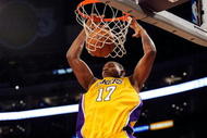 LOS ANGELES, CA - OCTOBER 30:  Andrew Bynum #17 of the Los Angeles Lakers dunks against Dallas Mavericks during the NBA basketball game at Staples Center on October 30, 2009 in Los Angeles, California.  NOTE TO USER: User expressly acknowledges and agrees that, by downloading and/or using this Photograph, user is consenting to the terms and conditions of the Getty Images License Agreement.  (Photo by Kevork Djansezian/Getty Images)