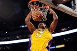 LOS ANGELES, CA - OCTOBER 30:  Andrew Bynum #17 of the Los Angeles Lakers dunks against Dallas Mavericks during the NBA basketball game at Staples Center on October 30, 2009 in Los Angeles, California.  NOTE TO USER: User expressly acknowledges and agrees that, by downloading and/or using this Photograph, user is consenting to the terms and conditions of the Getty Images License Agreement.  (Photo by Kevork Djansezian/Getty Images)