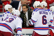 WASHINGTON - APRIL 15: Head Coach John Tortorella of the New York Rangers discuses strategy during a stoppage of play against the Washington Capitals during Game One of the Eastern Conference Quarterfinals Round of the 2009 Stanley Cup Playoffs on April 15, 2009 at the Verizon Center in Washington, DC. (Photo by Len Redkoles/Getty Images)
