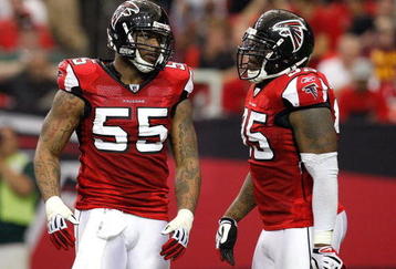 ATLANTA - NOVEMBER 08:  John Abraham #55 and Jonathan Babineaux #95 of the Atlanta Falcons against the Washington Redskins at Georgia Dome on November 8, 2009 in Atlanta, Georgia.  (Photo by Kevin C. Cox/Getty Images)