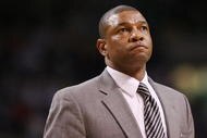 BOSTON - NOVEMBER 01:  Head coach Doc Rivers  of the Boston Celtics looks on during a time out in the second half against the New Orleans Hornets at the TD Garden on November 1, 2009 in Boston, Massachusetts. The Celtics defeated the Hornets 97-87. NOTE TO USER: User expressly acknowledges and agrees that, by downloading and or using this photograph, User is consenting to the terms and conditions of the Getty Images License Agreement.  (Photo by Elsa/Getty Images)