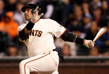SAN FRANCISCO - AUGUST 26:  Bengie Molina #1 of the San Francisco Giants hits a pinch hit 3 run home run to give the Giants a 4-3 lead in the eighth inning of their game against the Arizona Diamondbacks at AT&T Park on August 26, 2009 in San Francisco, California.  (Photo by Ezra Shaw/Getty Images for Reebok)