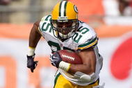 TAMPA, FL - NOVEMBER 08:  Running back Ryan Grant #25 of the Green Bay Packers runs the ball against the Tampa Bay Buccaneers during the game at Raymond James Stadium on November 8, 2009 in Tampa, Florida.  (Photo by J. Meric/Getty Images)