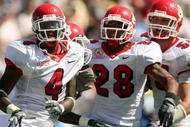 PASADENA, CA - SEPTEMBER 27:  Damion Owens #4, A.J. Jefferson #28 and Ben Jacobs #54 of the Frenso State Bulldogs celebrates a defensive play against the UCLA Bruins during the game on September 27, 2008 at the Rose Bowl in Pasadena, California.  (Photo by Stephen Dunn/Getty Images)