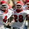 PASADENA, CA - SEPTEMBER 27:  Damion Owens #4, A.J. Jefferson #28 and Ben Jacobs #54 of the Frenso State Bulldogs celebrates a defensive play against the UCLA Bruins during the game on September 27, 2008 at the Rose Bowl in Pasadena, California.  (Photo by Stephen Dunn/Getty Images)