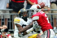 COLUMBUS, OH - SEPTEMBER 24:  Erik Haw #2 of Ohio State is called for pass interference on Clinton Solomon #88 of Iowa during the third quarter on September 24, 2005 at Ohio Stadium in Columbus, Ohio. Ohio State defeated Iowa 31-6.  (Photo by Harry How/Getty Images)
