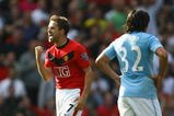 MANCHESTER, ENGLAND - SEPTEMBER 20:  Michael Owen of Manchester United celebrates scoring the winning goal in injury time during the Barclays Premier League match between Manchester United and Manchester City at Old Trafford on September 20, 2009 in Manchester, England.  (Photo by Alex Livesey/Getty Images)