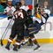 BUFFALO, NY - NOVEMBER 06: Dan Carcillo #13 of the Philadelphia Flyers checks Craig Rivet #52 of the Buffalo Sabres at HSBC Arena on November 6, 2009 in Buffalo, New York.  (Photo by Rick Stewart/Getty Images)