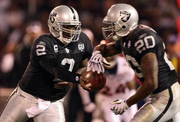 OAKLAND, CA - SEPTEMBER 8:  Quarterback JaMarcus Russell #2 of the Oakland Raiders hands off the ball to Darren McFadden #20 during the NFL game against the Denver Broncos on September 8, 2008 at McAfee Coliseum in Oakland, California. The Broncos defeated the Raiders 41-14. (Photo by Jed Jacobsohn/Getty Images)