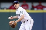 SEATTLE - SEPTEMBER 02:  Jack Wilson #9 of the Seattle Mariners throws to firstbase against the Los Angeles Angels of Anaheim at Safeco Field on September 2, 2009 in Seattle, Washington. (Photo by Otto Greule Jr/Getty Images)