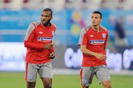 DOHA, QATAR - NOVEMBER 13: Darren Bent warms up with Jermaine Jenas during the England training session at the Khalifa Stadium on November 13, 2009 in Doha, Qatar.  (Photo by Michael Regan/Getty Images)