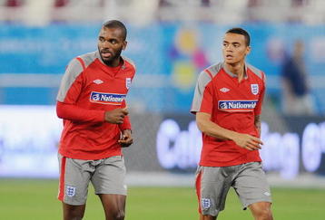 DOHA, QATAR - NOVEMBER 13: Darren Bent warms up with Jermaine Jenas during the England training session at the Khalifa Stadium on November 13, 2009 in Doha, Qatar.  (Photo by Michael Regan/Getty Images)