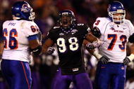 SAN DIEGO, CA - DECEMBER 23: Defensive End Jerry Hughes #98 of the TCU Horned Frogs celebrates his sack Quarterback Kellen Moore #11 of Boise State Broncos during Frogs' 17-16 win over the Broncos in the San Diego County Credit Union Poinsettia Bowl at Qualcomm Stadium on December 23, 2008 in San Diego, California. (Photo by Donald Miralle/Getty Images)