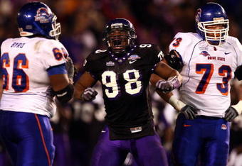 SAN DIEGO, CA - DECEMBER 23:  Defensive End Jerry Hughes #98 of the TCU Horned Frogs celebrates his sack Quarterback Kellen Moore #11 of Boise State Broncos during Frogs' 17-16 win over the Broncos in the San Diego County Credit Union Poinsettia Bowl at Qualcomm Stadium on December 23, 2008 in San Diego, California. (Photo by Donald Miralle/Getty Images)