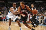 NEW ORLEANS - NOVEMBER 13:  Andre Miller #24 of the Portland Trail Blazers drives the ball against Chris Paul #3 of the New Orleans Hornets during the game at New Orleans Arena on November 13, 2009 in New Orleans, Louisiana.  NOTE TO USER: User expressly acknowledges and agrees that, by downloading and or using this photograph, User is consenting to the terms and conditions of the Getty Images License Agreement. (Photo by Chris Graythen/Getty Images)
