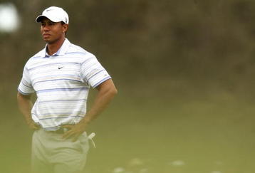 MELBOURNE, AUSTRALIA - NOVEMBER 14:  Tiger Woods of the USA prepares to play an approach shot on the 3rd hole during round three of the 2009 Australian Masters at Kingston Heath Golf Club on November 14, 2009 in Melbourne, Australia.  (Photo by Quinn Rooney/Getty Images)